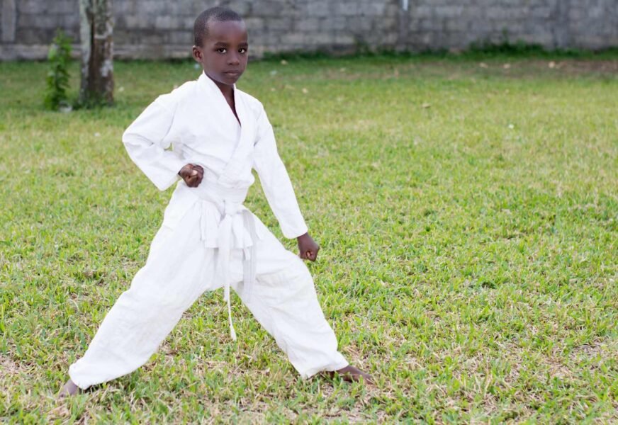 Profile,Of,A,Young,Boy,In,A,Kimono,Practicing,Karate